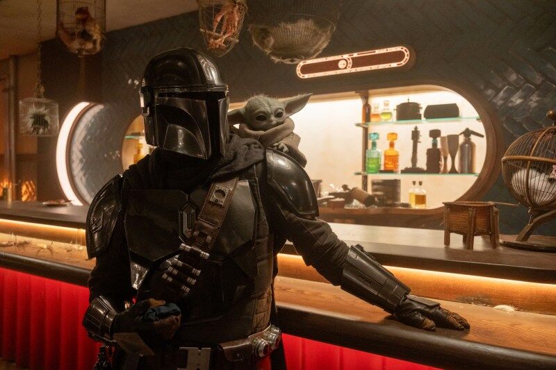 (L-R) Mandalorian (Pedro Pascal) and Grogu in Lucasfilm's THE MANDALORIAN AND GROGU. Photo by Nicola Goode. © 2025 Lucasfilm Ltd™. All Rights Reserved.